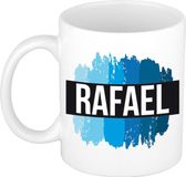 Bellatio Decorations Rafael naam cadeau koffie mok - beker - met blauw verfstrepen - Cadeau collega - vaderdag - verjaardag - meester - coach - 300 ml - wit