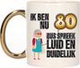 Bellatio Decorations Mok 80 jaar - Luid en duidelijk oma - Goudkleurig - Keramiek - 300 ml