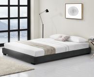 Corium Houten bed Laag kunstleer met bedbodem 140x200 cm zwart