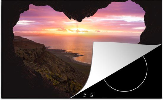 KitchenYeah® Inductie beschermer 77x51 cm - Hartvormige opening van een grot uitkijkend over een prachtige zonsondergang op Lanzarote - Inductie beschermer