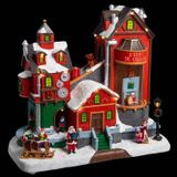 Féerie Lights en Village de Noël avec usine de cadeaux, 22 LED, H 27,5 cm, avec musique et pièces mobiles EIRIK