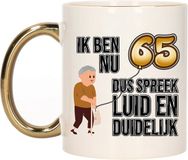 Bellatio Decorations Verjaardag cadeau mok 65 jaar - luid en duidelijk - goud - 300 ml - Keramiek
