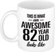 Bellatio Decorations Shoppartners Bv This is what an awesome 82 year old looks like - cadeau koffiemok - beker - 300 ml - verjaardag 82 jaar - kado mok / beker