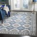 Safavieh PTN320 Traditioneel tapijt voor binnen, vierkant, 122 x 122 cm, blauw/ivoorkleurig