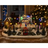 Lumineo Kerstdorp kerst tafereel - schaatsbaan - met verlichting en beweging - 41 cm - polyresin - winter scene