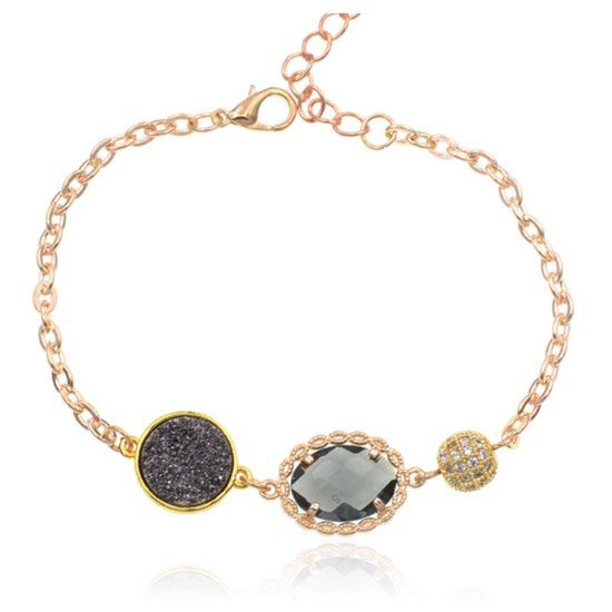 Deja Jewels Goudkleurige verstelbare dames armband met grijs glassteen