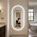 Miroir LED mural pour salle de bain - Ovale, design sans cadre - Verre trempé, éclairage arrière, anti-buée, commande tactile, fonction mémoire, protection IP44, 120x60 cm