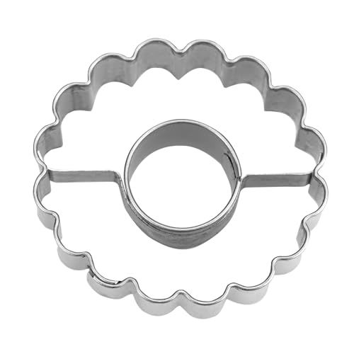 Staedter Linzer-uitsteker ring in ring ø 4 cm/H 1,5 cm gegolfd