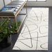 Safavieh Melody Collection Geometrisch tapijt voor woonkamer, eetkamer, slaapkamer - korte pool, ivoor en zwart, 67 x 244 cm