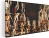 Artaza Canvas Schilderij Glazen met Sterke Drank - Flessen - 100x50 cm - Canvas Print