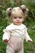 Poupée reborn "Pippa", 66 cm, avec cheveux implantés