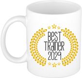 Bellatio Decorations Cadeau koffie/thee mok - de beste trainer van 2029 - wit - 300 ml - keramiek