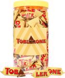 Toblerone Tiny - melkchocolade met nougat, amandel en honing - 500g