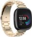 Strap-it Stalen schakel bandje - horlogeband metaal geschikt voor Fitbit Versa 4 / Sense 2 - champagne goud