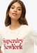 Superdry Brand Mark T-shirt met relaxte pasvorm voor dames in chalk white