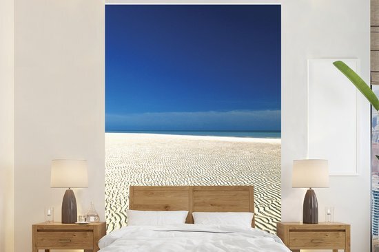 Nr1Wallpaper Behang - Fotobehang Een bijzondere structuur in het witte strand van het tropische Nationaal park Lucayan - Breedte 145 cm x hoogte 220 cm