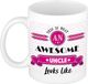 Bellatio Decorations Cadeau koffiemok voor een geweldige oom - roze - keramiek - 300 ml
