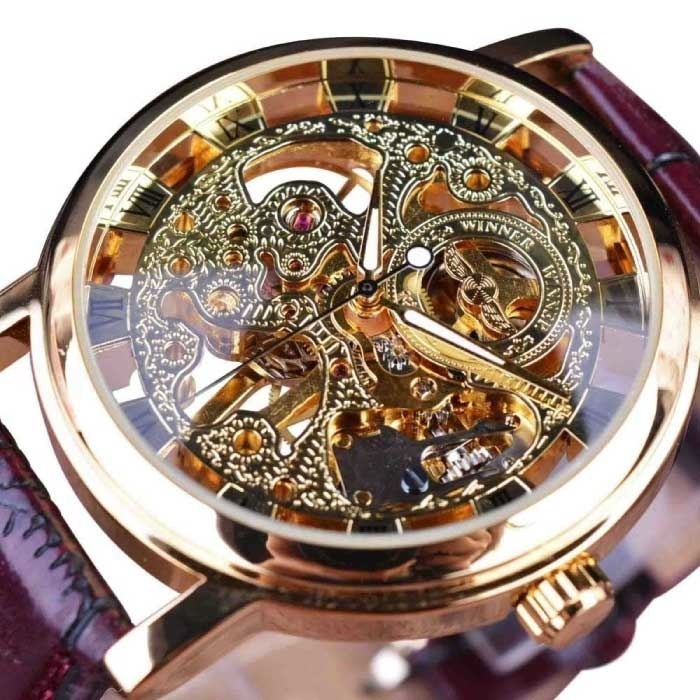 Winner Winner Gouden Kast Luxe Horloge voor Heren - Leren Bandje Transparant Mechanisch Skelet Goud Bruin