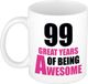 Bellatio Decorations Shoppartners Bv Verjaardag 99 jaar Koffiemok Cadeau - Great years of being awesome - wit/roze - beker - Jubileum - voor dames - vrouwen