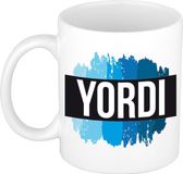 Bellatio Decorations Shoppartners Bv Yordi naam cadeau koffie mok - beker - met blauw verfstrepen - Cadeau collega - vaderdag - verjaardag - meester - coach - 300 ml - wit