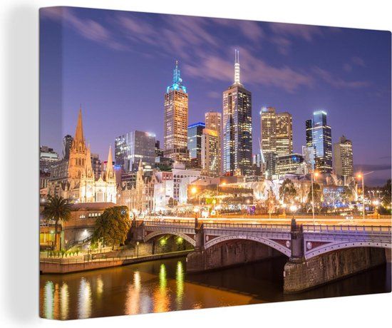 OneMillionCanvasses Canvas schilderij 150x100 cm - Skyline van Melbourne in de nacht - Multicolor