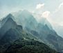 Komar Fotobehang - The Summit 300x250cm - Vliesbehang