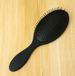 New Age Devi brosse démêlante Noir Plastique