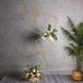 Gouden decoratieve bloemenstandaard