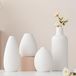 Vases en céramique blancs - set de 4
