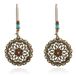 Deja Jewels Lookinggoodtoday Goudkleurige ronde bewerkte dames oorbellen met stenen en kralen