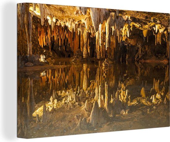 OneMillionCanvasses Canvas schilderij 150x100 cm - Gouden stalactieten in Ohio Caverns - Multicolor - Rechthoek
