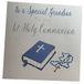 Wit Cotton Cards XN89GS Grote handgemaakte kaart met tekst "To A Special Grandson On Your 1st Holy Communion", blauwe bijbelkaart