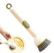 Brosse de cuisine avec distributeur de savon pour la vaisselle