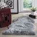 SAFAVIEH Vloerkleed met dierenprint - Fur Collection, hoge pool, staalblauw, 61 x 91 cm