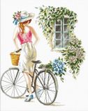 Needleart World Voorbedrukt borduurpakket meisje met fiets op aida 640.078