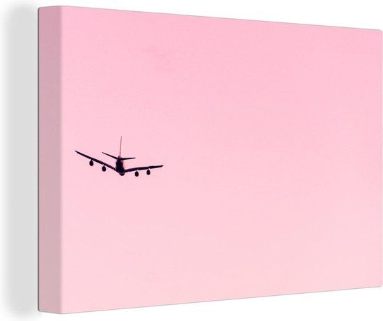 OneMillionCanvasses Canvas schilderij 150x100 cm - Stijgend vliegtuig in roze lucht - Muurdecoratie