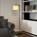 Lampadaire sur pied réglable, intensité variable et 2 modes de lumière, télécommande incluse, arrêt différé 60 min, hauteur 160 cm, finition noire
