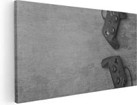 Artaza Canvas Schilderij Deux manettes de jeu sur table - Gaming - 100x50 cm