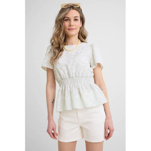 Anytime lichtgroen all-overprint peplum top
