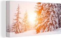 OneMillionCanvasses Canvas Schilderij Zon - Bomen - Sneeuw - 80x40 cm - Kerstman - Wanddecoratie