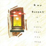 Suburban Ray Russell A Table Near the Band