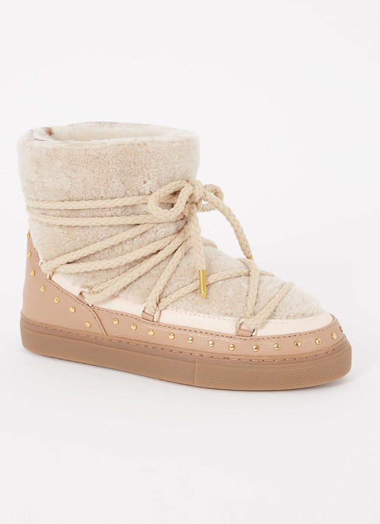 Inuikii Curly Rock snowboot van schapenvacht met leren details