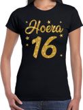Bellatio Decorations Shoppartners Bv Hoera 16 jaar verjaardag cadeau t-shirt - goud glitter op zwart - dames - cadeau shirt L