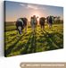 OneMillionCanvasses Canvas Schilderij Koeien - 140x90 cm - Wanddecoratie