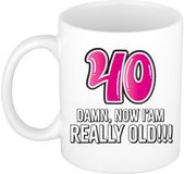 Bellatio Decorations Verjaardag cadeau mok 40 jaar - nu ben ik echt oud! - roze - 300 ml - keramiek