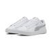 PUMA Baskets blanches avec détails argentés, logo sur le côté, semelle en caoutchouc
