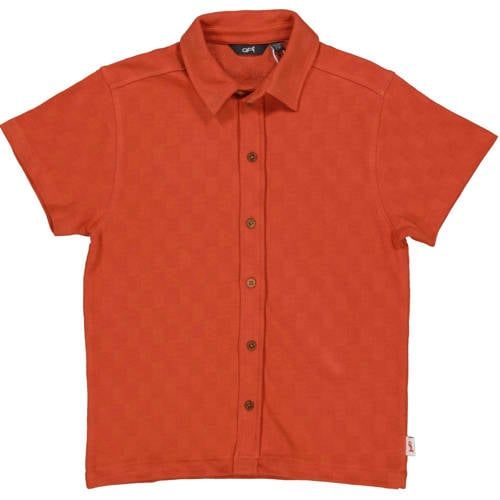 QPI polo oranje met textuur