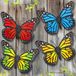 EOORAU Metalen vlinder muurkunst buitendecoratie - 4 stuks 24,9 cm vlinders muursculptuur hangend decor voor thuis, tuin, terras, tuindecoratie (4 kleuren)