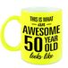 Bellatio Decorations Awesome 50 year old looks like - cadeau koffiemok - fluor geel - 330ml -