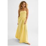 BEACHWAVE strapless mousseline strandjurk lichtgeel